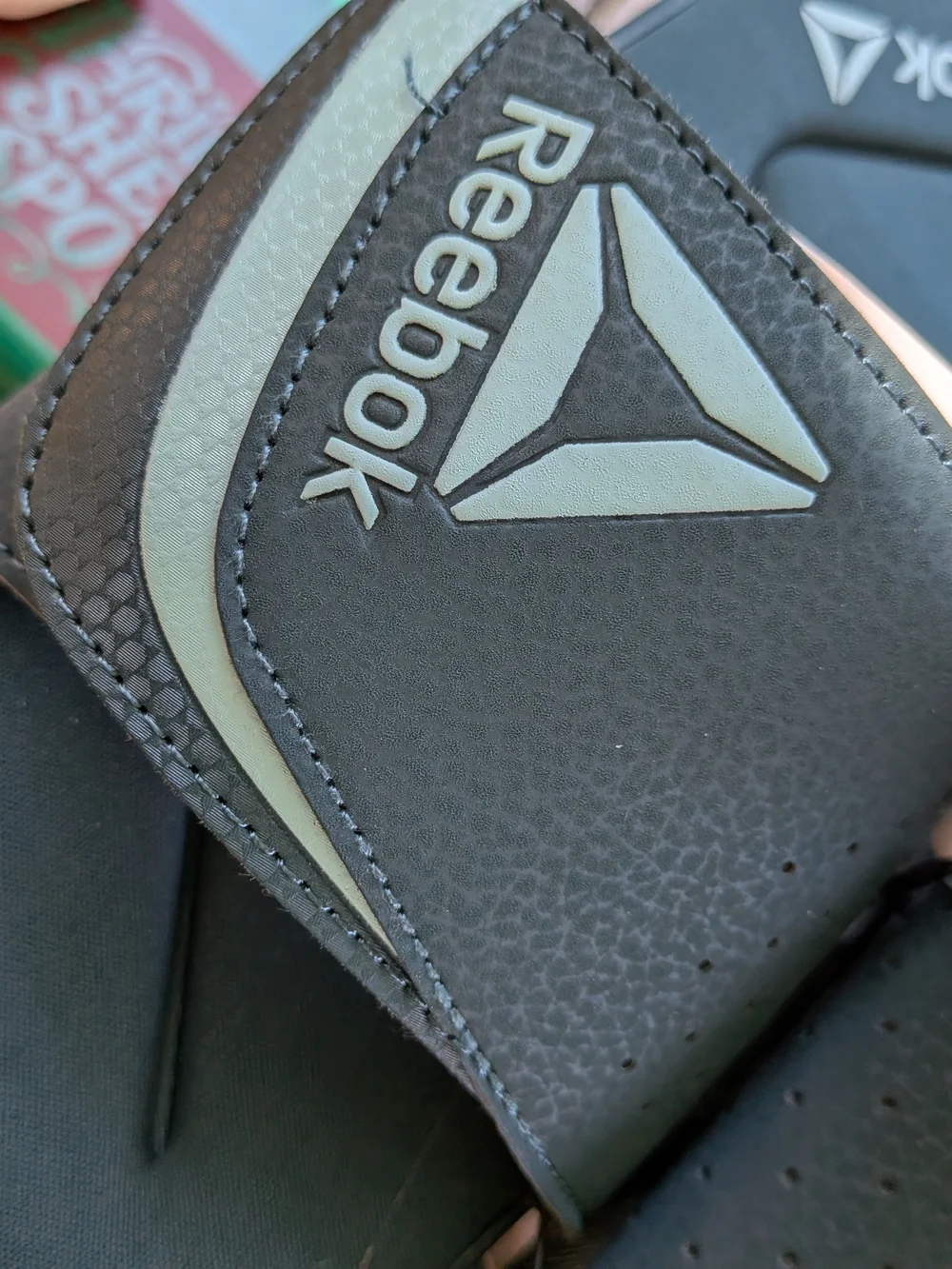 Reebok  Slide Sandals in Black with Light Mint Logo